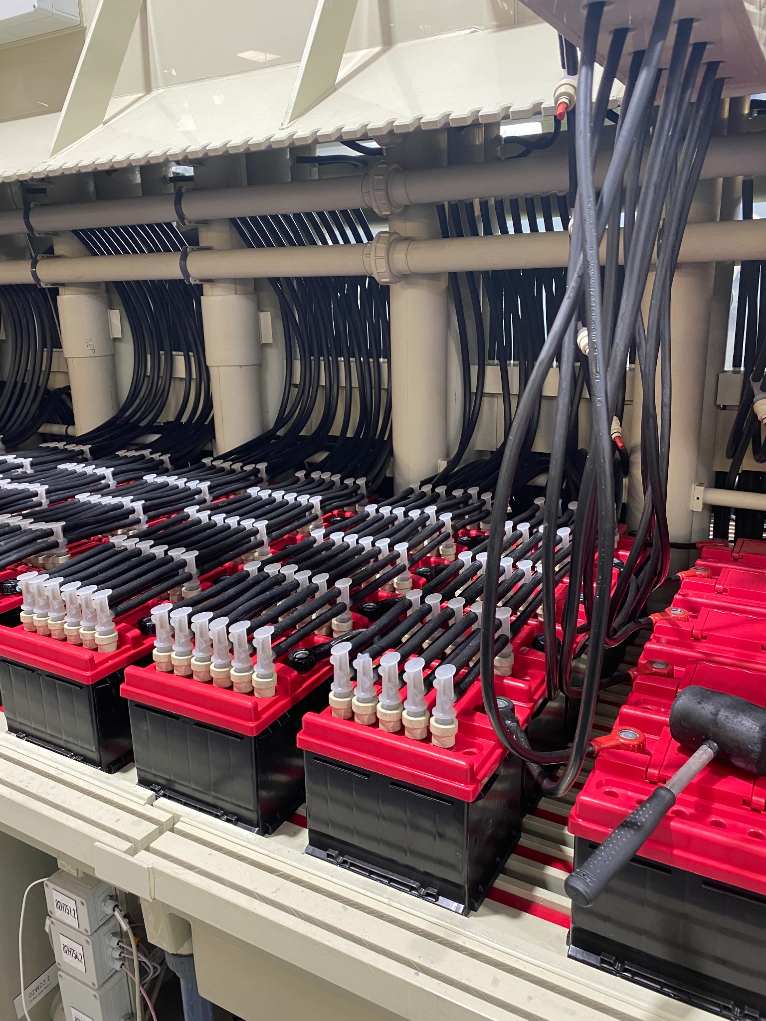 FESOL project photograph of a battery bank and connected cabling